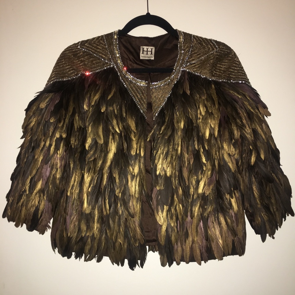 Feather jacket with rhinestone trim.
